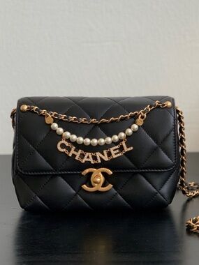 VIP black quilted black crossbody bag